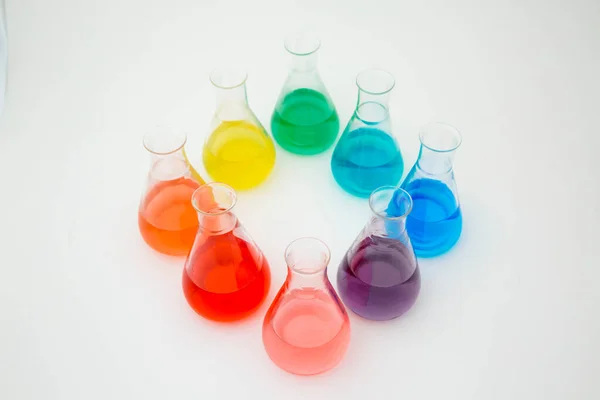 Scientific Laboratory Flask Filled Colorful Liquid Forming Rainbow White Background — Stock Photo, Image