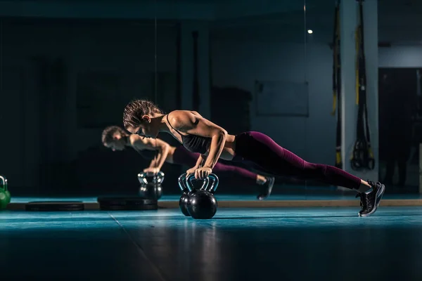 Young Woman Gym Doing Push Ups Help Ball Shaped Weight — Stock Photo, Image