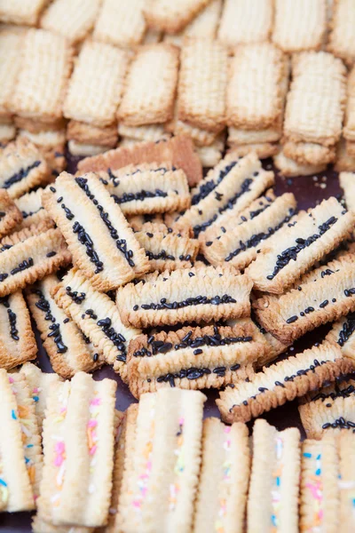 Freshly baked decorated condensed milk biscuits — Stock Photo, Image