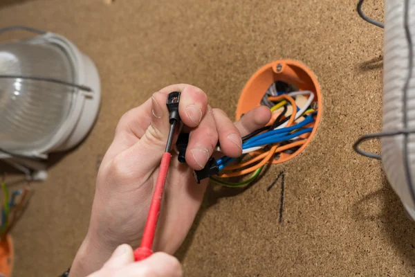 Electricians screwed on terminal — Stock Photo, Image