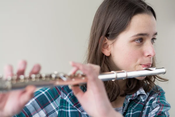 Girl playing flute - Portrait — Stock Photo, Image