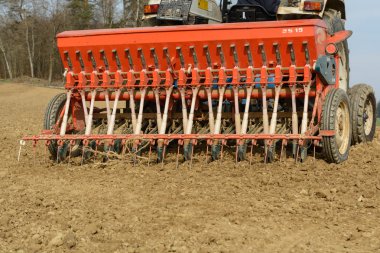 Cultivation machine for sowing cereals clipart