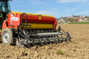 Grain sowing machine with attachments clipart