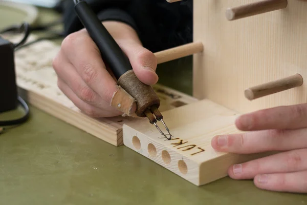 Pyrography with internal Peter — Stock Photo, Image