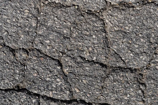 沥青路面的不规则裂缝 背景和模式 — 图库照片