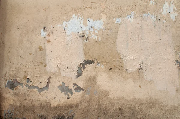 Textura de pared vieja cubierta con estuco amarillo — Foto de Stock