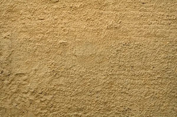 Textura de la pared cubierta de estuco amarillo — Foto de Stock