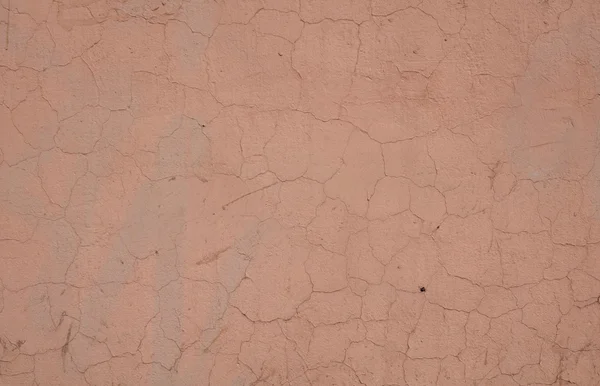 Textura de pared cubierta con pelado de estuco rosa — Foto de Stock