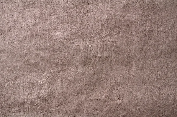 Textura de pared vieja cubierta con estuco rosa — Foto de Stock