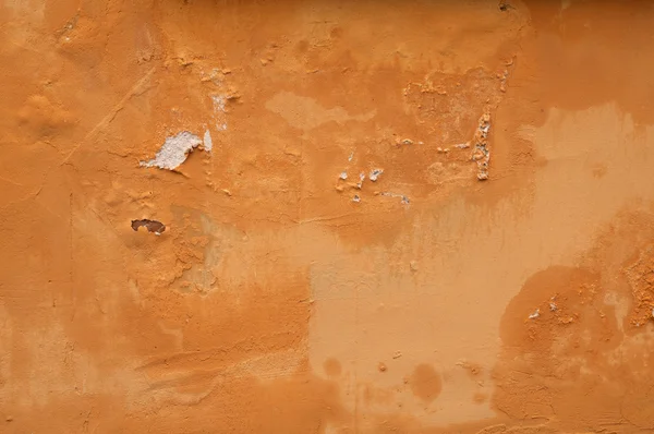 Textura de pared vieja cubierta con estuco amarillo — Foto de Stock