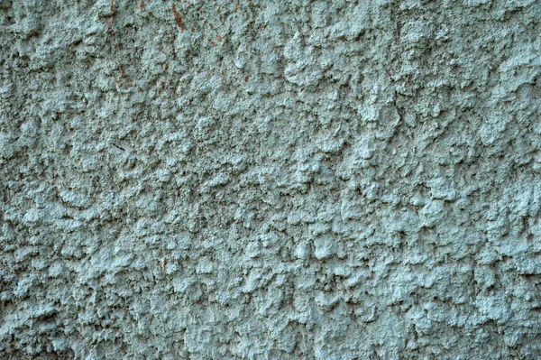 Texture di vecchia parete ricoperta di stucco verde — Foto Stock