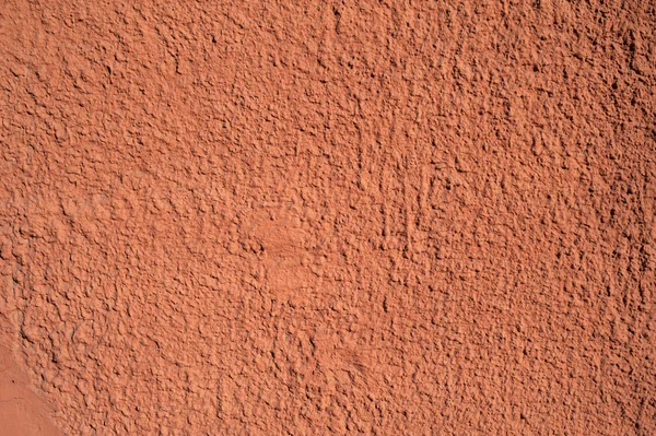 Textura de pared vieja cubierta con estuco naranja —  Fotos de Stock