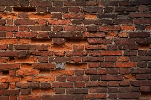 Tekstura stare uszkodzone czerwony mur z cegły — Zdjęcie stockowe