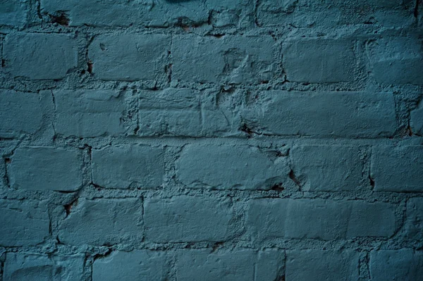 Текстура кирпичной стены, покрытая синей краской — стоковое фото