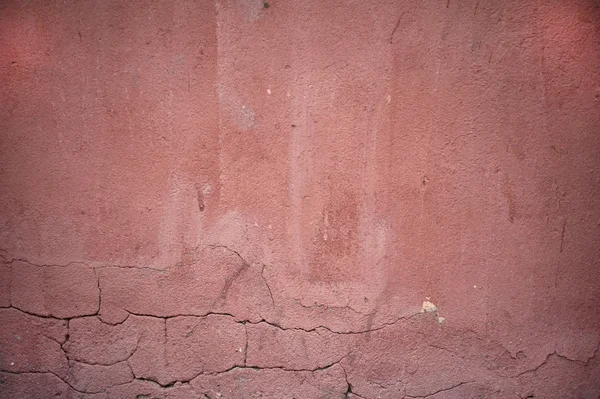 Textura de parede velha coberta com estuque rosa — Fotografia de Stock