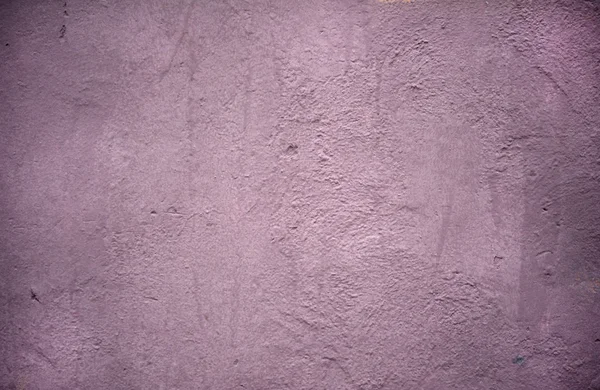 Textuur van muur bedekt met lila stucwerk — Stockfoto
