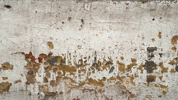 Текстура старой стены покрыта желтой, серой и красной штукатуркой — стоковое фото