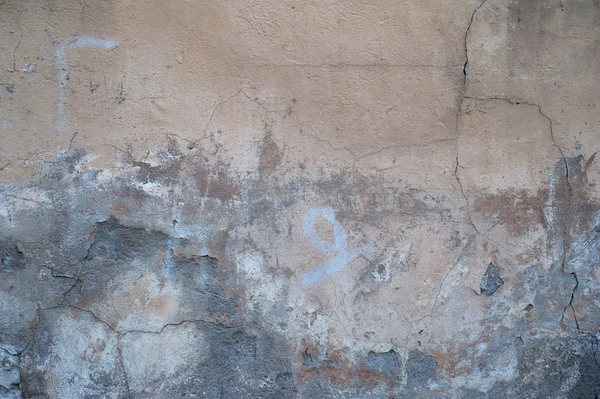 Textura de pared vieja cubierta con estuco amarillo — Foto de Stock