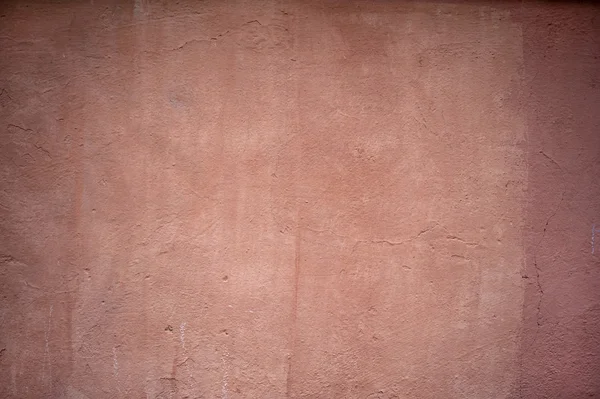 Tekstura stare ściany pokryte różowy stiuk — Zdjęcie stockowe