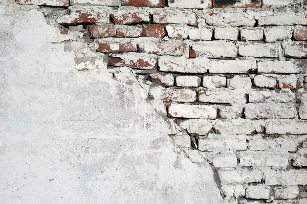 Texture of old red brick wall covered with cement — Stock Photo, Image