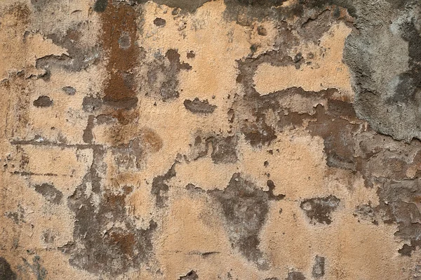 Textura de pared vieja cubierta con estuco amarillo —  Fotos de Stock