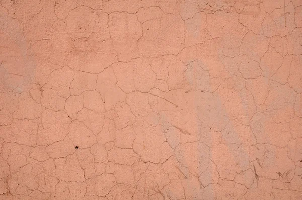 Textura de pared vieja cubierta con estuco rosa — Foto de Stock