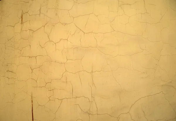 Texture della vecchia parete ricoperta di stucco giallo — Foto Stock