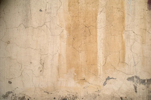 Textura de pared vieja cubierta con estuco amarillo — Foto de Stock