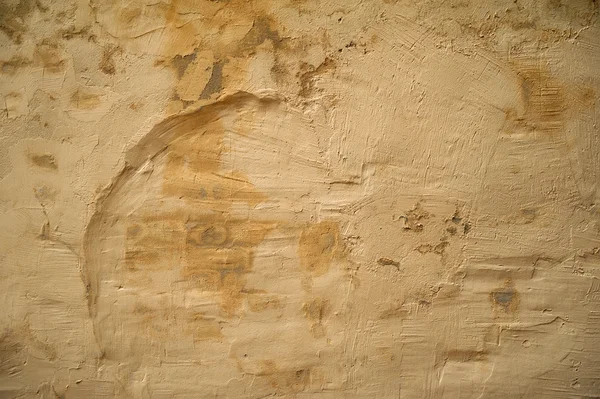 Textura de pared vieja cubierta con estuco amarillo — Foto de Stock