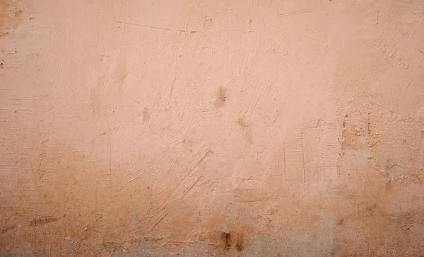 Textura de pared vieja cubierta con estuco rosa — Foto de Stock