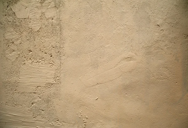 Textura de pared vieja cubierta con estuco amarillo — Foto de Stock