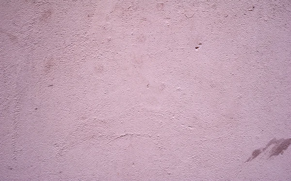 Textura de pared vieja cubierta con estuco rosa — Foto de Stock