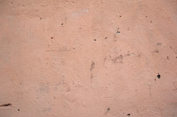 Textura de pared vieja cubierta con estuco rosa — Foto de Stock