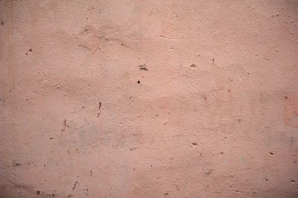 Textura de parede velha coberta com estuque rosa — Fotografia de Stock