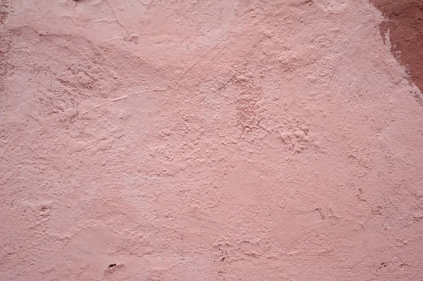 Textur der alten Mauer mit rosa Stuck verkleidet — Stockfoto