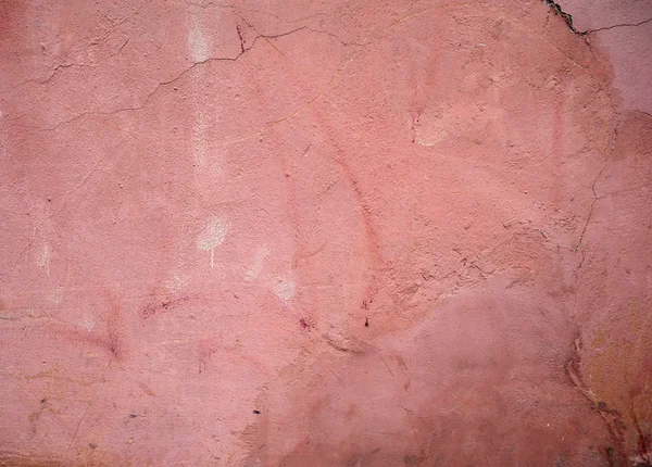 Textura de pared vieja cubierta con estuco rosa — Foto de Stock