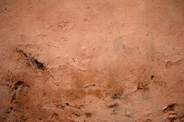 Texture di vecchia parete ricoperta di stucco rosa — Foto Stock