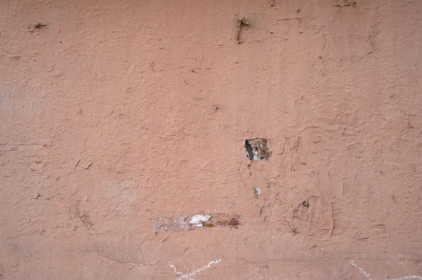 Textura de pared vieja cubierta con estuco rosa — Foto de Stock