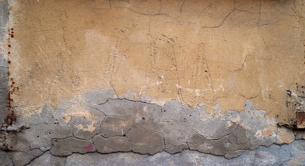 Текстура старої стіни покрита жовтим ліпниною — стокове фото