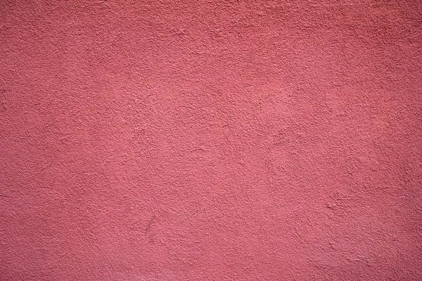 深紅色の漆喰で覆われた古い壁のテクスチャ — ストック写真