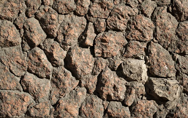 Textura de pared de piedras rojas procesadas en bruto — Foto de Stock