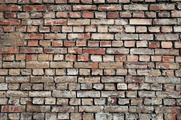 Textura de la vieja pared de ladrillo rojo — Foto de Stock