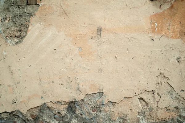 Textura de pared vieja cubierta con estuco amarillo — Foto de Stock