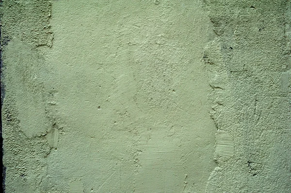 Textura de pared vieja cubierta con estuco verde — Foto de Stock