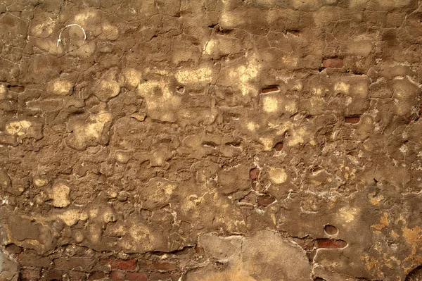 Texture of old wall covered with yellow stucco — Stock Photo, Image