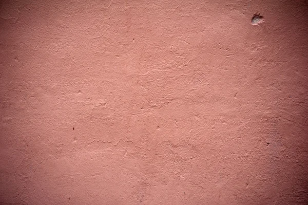 Textuur van oude muur bedekt met roze stucwerk — Stockfoto