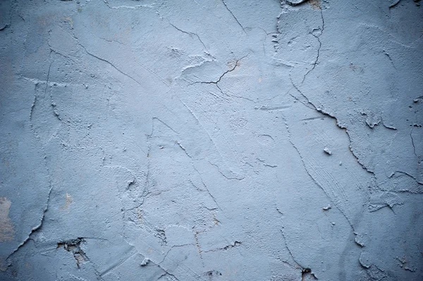 纹理的老墙上覆盖着灰色的灰泥 — 图库照片