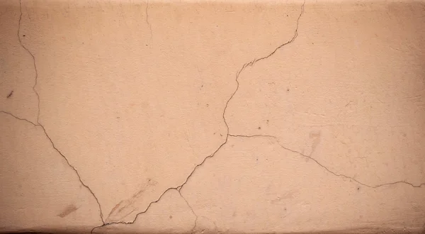 Texture di vecchia parete ricoperta di stucco marrone — Foto Stock