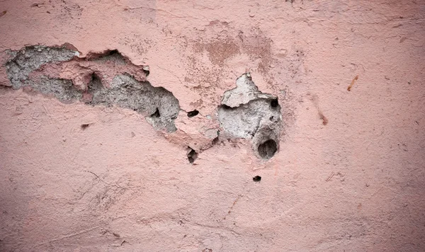 Textura de parede velha coberta com estuque rosa — Fotografia de Stock