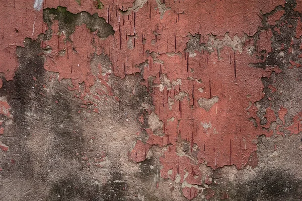 Textur der alten Mauer mit rotem Stuck überzogen — Stockfoto